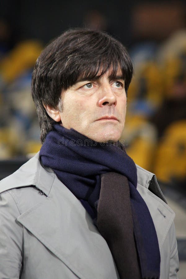 KYIV, UKRAINE - NOVEMBER 11, 2011: Germany national team head coach Joachim Low looks on during friendly game against Ukraine at NSK Olimpic stadium on November 11, 2011 in Kyiv, Ukraine. KYIV, UKRAINE - NOVEMBER 11, 2011: Germany national team head coach Joachim Low looks on during friendly game against Ukraine at NSK Olimpic stadium on November 11, 2011 in Kyiv, Ukraine