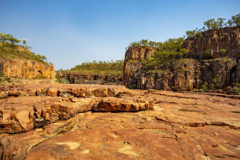 View of the river rocky bed between the deep Gorge 1 and Gorge 2, in Nitmiluk Katherine Gorge National Park, Northern Territory, Australia. View of the river rocky bed between the deep Gorge 1 and Gorge 2, in Nitmiluk Katherine Gorge National Park, Northern Territory, Australia