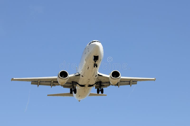 Aircraft on approach with a blue background. Aircraft on approach with a blue background