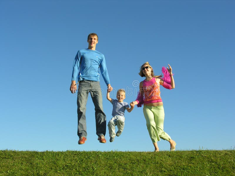 Fly happy family on blue sky 2 green grass. Fly happy family on blue sky 2 green grass