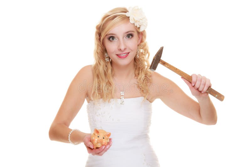 Money saving, marriage and high wedding cost concept. Funny woman bride with hammer about to smash piggy bank isolated on white. Money saving, marriage and high wedding cost concept. Funny woman bride with hammer about to smash piggy bank isolated on white