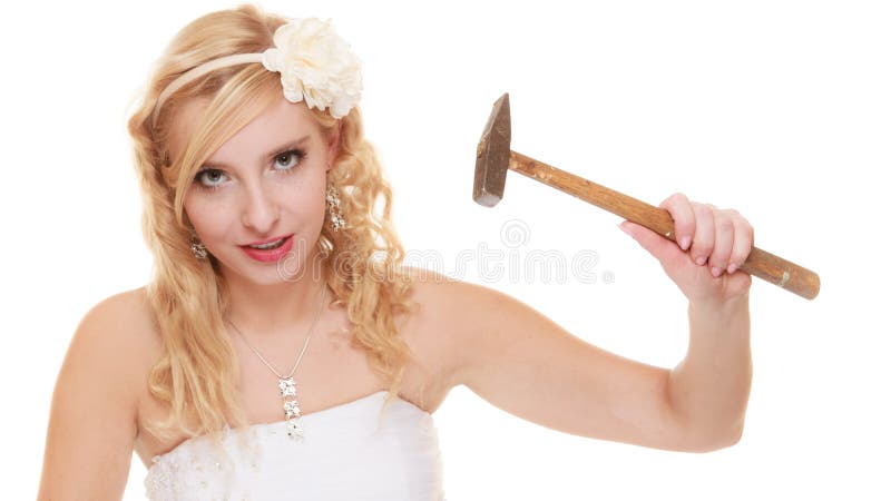 Money saving, marriage and high wedding cost concept. Funny woman bride with hammer about to smash piggy bank isolated on white. Money saving, marriage and high wedding cost concept. Funny woman bride with hammer about to smash piggy bank isolated on white