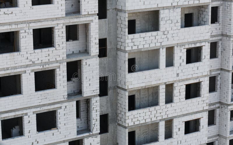 Unfinished building from white bricks - construction process. Unfinished building from white bricks - construction process