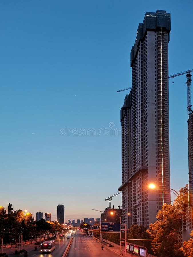 Closeup of unfinished commercial apartments in the sunset , wuhan city, hubei province, china. Closeup of unfinished commercial apartments in the sunset , wuhan city, hubei province, china