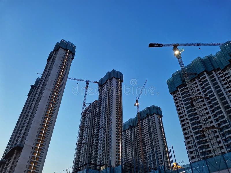 Closeup of unfinished commercial apartments in the sunset , wuhan city, hubei province, china. Closeup of unfinished commercial apartments in the sunset , wuhan city, hubei province, china