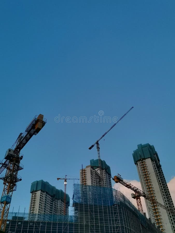 Closeup of unfinished commercial apartments in the sunset , wuhan city, hubei province, china. Closeup of unfinished commercial apartments in the sunset , wuhan city, hubei province, china