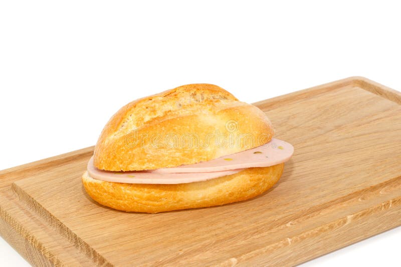 Немецкий хлебец с mortadella на подносе завтрака стоковое изображение Немецкий хлебец с mortadella на подносе завтрака стоковое изображение