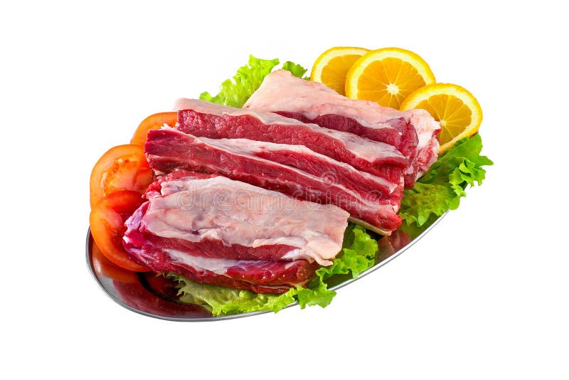 Нервюры свежих и сырого мяса и свиные отбивние изолированные на белом backgro стоковые фото Нервюры свежих и сырого мяса и свиные отбивние изолированные на белом backgro стоковые фото