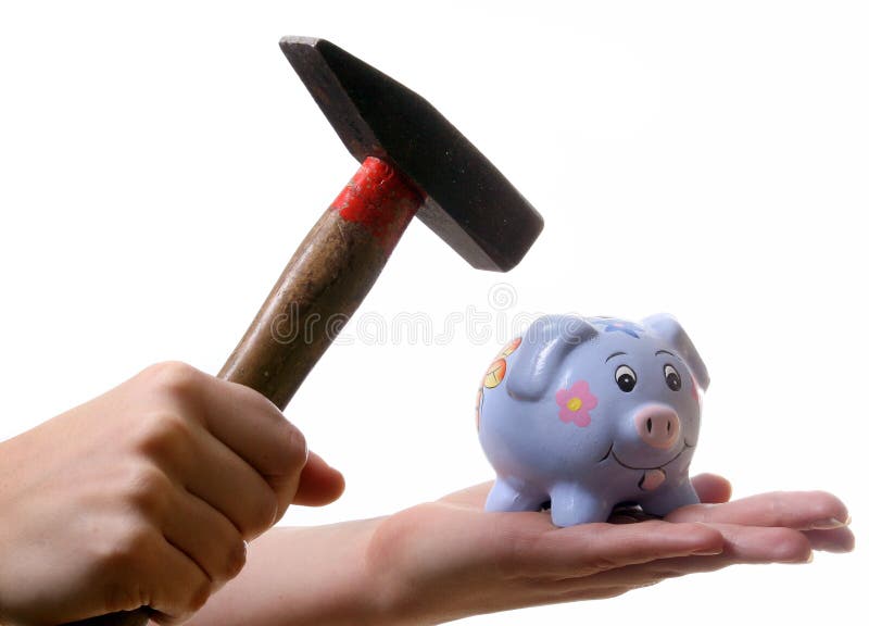 A young woman is breaking her piggybank with a hammer. Isolated over white with a lot of space for text!. A young woman is breaking her piggybank with a hammer. Isolated over white with a lot of space for text!