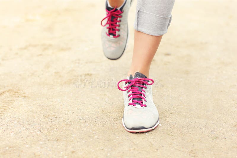 A picture of jogger's legs on sand. A picture of jogger's legs on sand