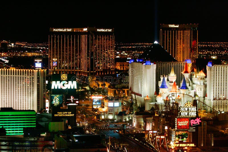 The colorful Las Vegas lights are shown at night. The colorful Las Vegas lights are shown at night.
