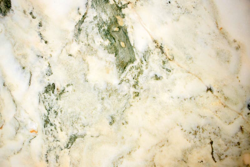 Lightened slices marble onyx. Horizontal image. Warm green colors. Beautiful close up background. Ideal for sites, banners, brochures, design. Lightened slices marble onyx. Horizontal image. Warm green colors. Beautiful close up background. Ideal for sites, banners, brochures, design