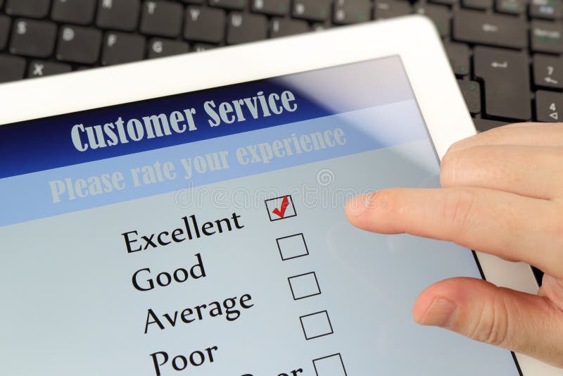 Online customer service satisfaction survey on a digital tablet. Online customer service satisfaction survey on a digital tablet