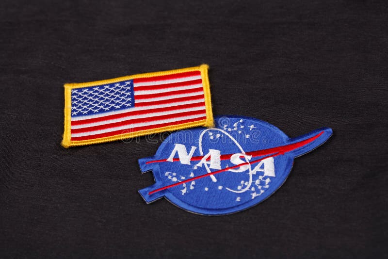 15-ое марта 2018 - заплата эмблемы NASA (NASA) и заплата флага США на черной форме стоковые изображения 15-ое марта 2018 - заплата эмблемы NASA (NASA) и заплата флага США на черной форме стоковые изображения