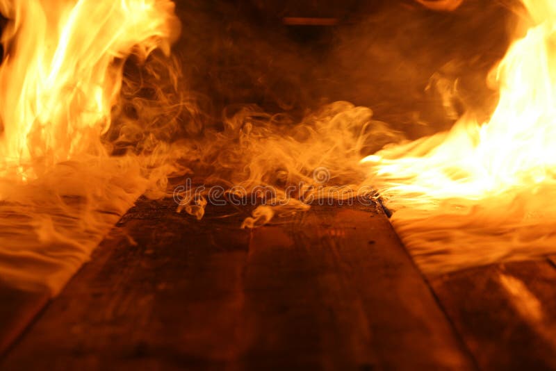 Flames and smoke are witnessed as a piece of furniture is burned. Flames and smoke are witnessed as a piece of furniture is burned.