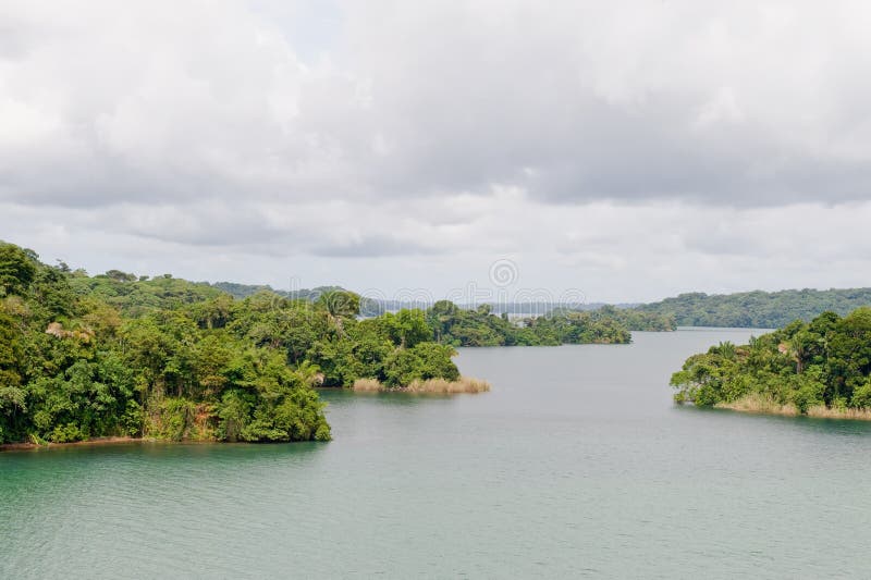 Scenic view of Gatun lake with forested shoreline, Panama canal, Central America. Scenic view of Gatun lake with forested shoreline, Panama canal, Central America.