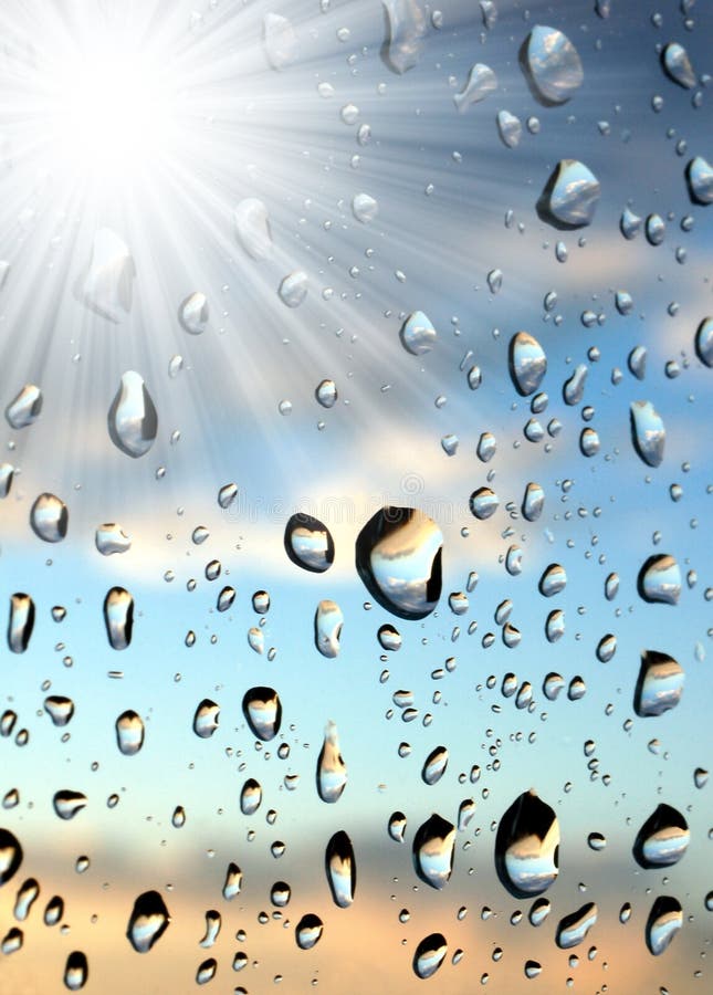 Drops of water on the window with the sun. Drops of water on the window with the sun