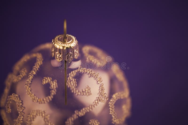 Glass Christmas ornament with gold decoration. Glass Christmas ornament with gold decoration