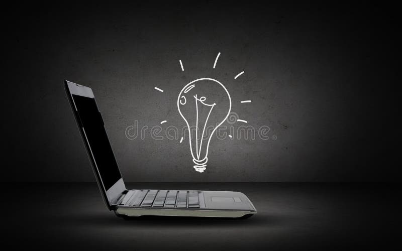 Открытый портативный компьютер с doodle шарика освещения стоковые фото