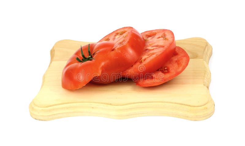 Thick succulent slices of a beefsteak tomato on a cutting board. Thick succulent slices of a beefsteak tomato on a cutting board.
