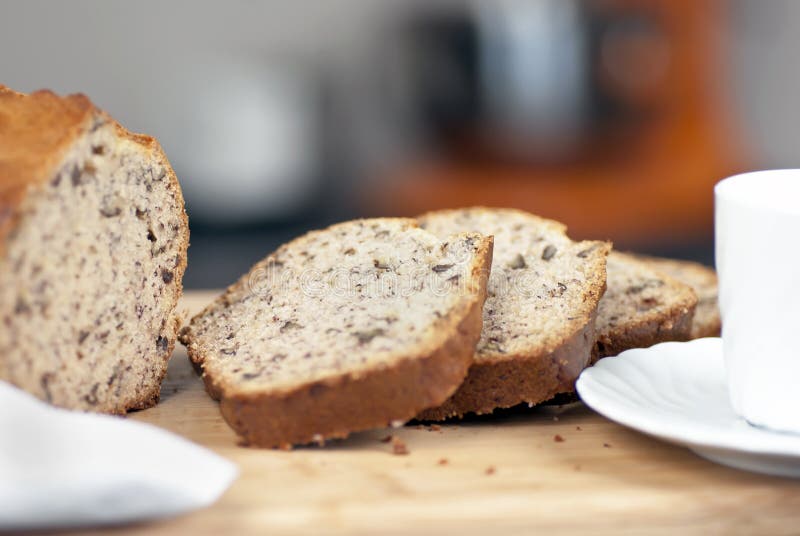 Close-up of fresh sliced banana bread and coffee. Close-up of fresh sliced banana bread and coffee.