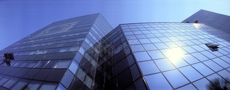 Landscape panoramic view of an office building. (film scan, Horizon non standard panoramic ratio 2.4:1). Landscape panoramic view of an office building. (film scan, Horizon non standard panoramic ratio 2.4:1)