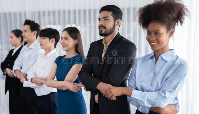 Happy and smiling multiracial office worker hold hand in a line, promoting synergy and collaboration for business success. Diverse professional office worker bond at modern workplace. Concord. Happy and smiling multiracial office worker hold hand in a line, promoting synergy and collaboration for business success. Diverse professional office worker bond at modern workplace. Concord