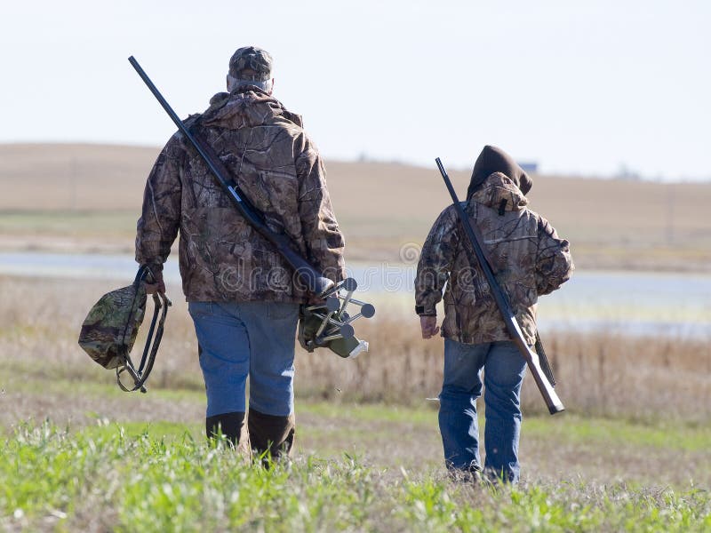 A father and son out hunting. A father and son out hunting