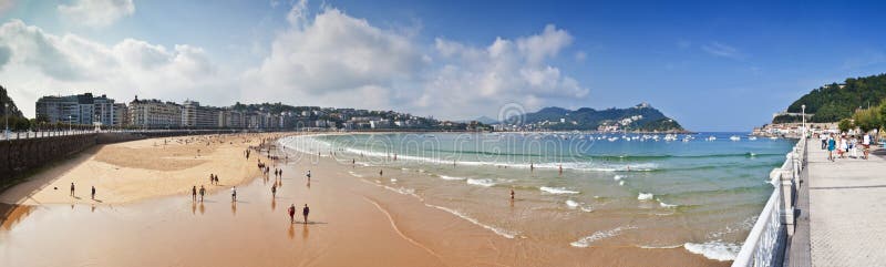 Beach of La Concha in San Sebastian, Spain. With length of 1350 meters and 40 meters wide, it is one of the most famous urban beaches in Spain. Beach of La Concha in San Sebastian, Spain. With length of 1350 meters and 40 meters wide, it is one of the most famous urban beaches in Spain.