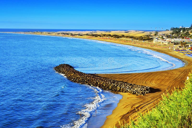Пляж Playa del Ingles и дюны Maspalomas, Gran Canaria, Испания стоковая фотография rf Пляж Playa del Ingles и дюны Maspalomas, Gran Canaria, Испания стоковая фотография rf