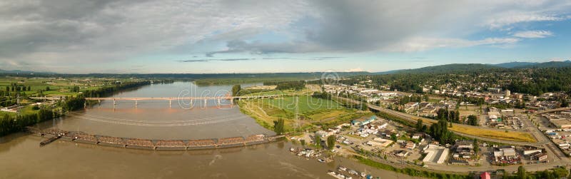 Aerial Panoramic View of Fraser River, Bridge and Mission City. Located East of Vancouver, British Columbia, Canada. Aerial Panoramic View of Fraser River, Bridge and Mission City. Located East of Vancouver, British Columbia, Canada.
