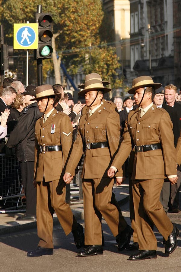 London, UK - November 13, 2011: People, Gurkha, take part in Remembrance Day, Poppy Day or Armistice Day, 11 every Nov, observed by Commonwealth of Nations, to remember armed forces who have died since First World War, Parade. London, UK - November 13, 2011: People, Gurkha, take part in Remembrance Day, Poppy Day or Armistice Day, 11 every Nov, observed by Commonwealth of Nations, to remember armed forces who have died since First World War, Parade.