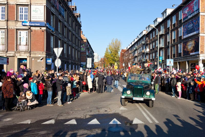 GDANSK, POLAND - NOVEMBER 11: The annual parade on the occasion of the Independence Day. March through the streets, and a demonstration of old vehicles, November 11, 2011 in Gdansk. GDANSK, POLAND - NOVEMBER 11: The annual parade on the occasion of the Independence Day. March through the streets, and a demonstration of old vehicles, November 11, 2011 in Gdansk.