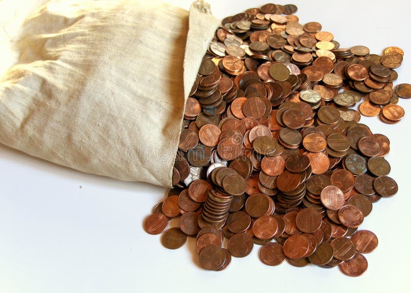 Pile of pennies spilling out of a white bank bag. Pile of pennies spilling out of a white bank bag