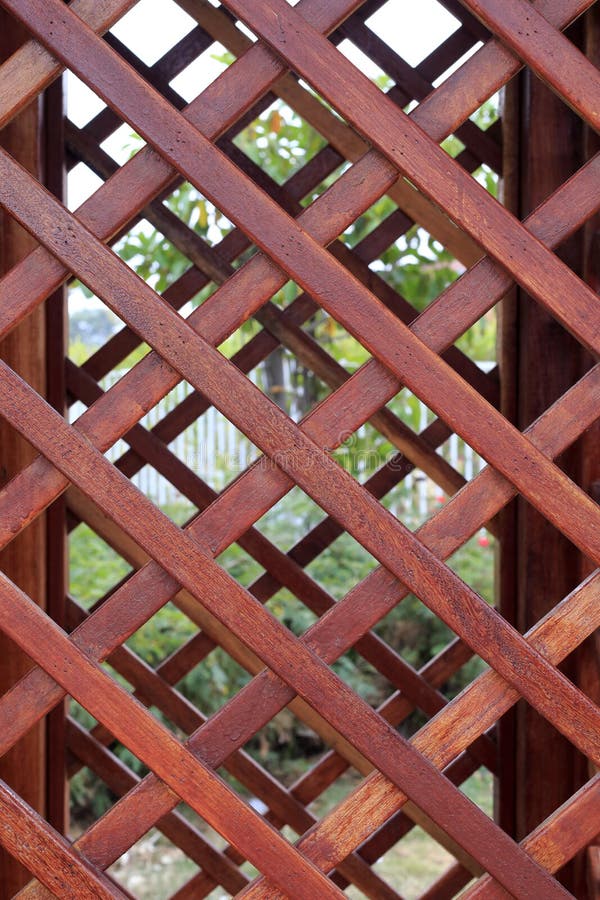The overlapping brown wooden lattice. The overlapping brown wooden lattice
