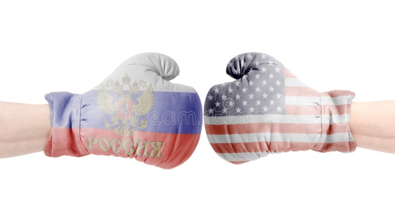 Перчатки бокса с США и флагом русского США против концепции России стоковые фотографии rf Перчатки бокса с США и флагом русского США против концепции России стоковые фотографии rf