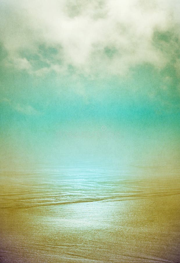 Sand and flowing ocean water disappearing into the horizon with swirling fog above. Image displays a pleasing grain pattern at 100 percent. Sand and flowing ocean water disappearing into the horizon with swirling fog above. Image displays a pleasing grain pattern at 100 percent.