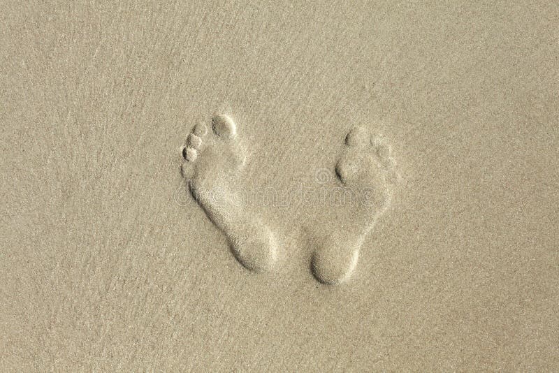 Background with footprints in the sand. Background with footprints in the sand