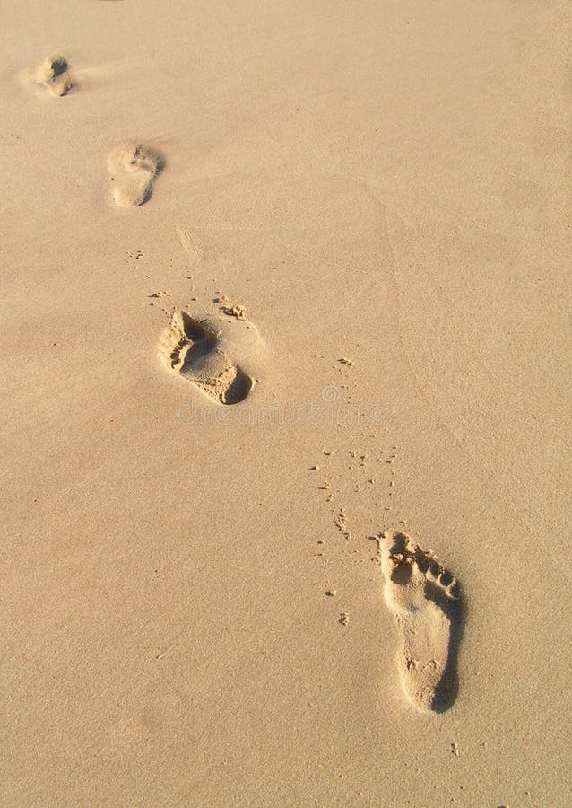 Footprints in the sand. evening light. Footprints in the sand. evening light.