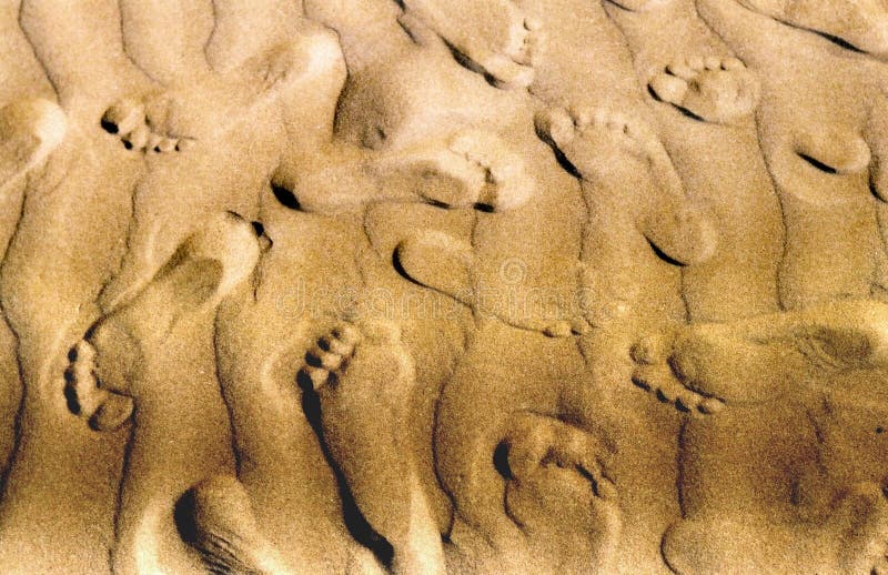 Footprints in the sand in the south of France. Footprints in the sand in the south of France