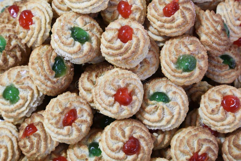 Печенья миндалины украшенные с candied плодом стоковое изображение Печенья миндалины украшенные с candied плодом стоковое изображение