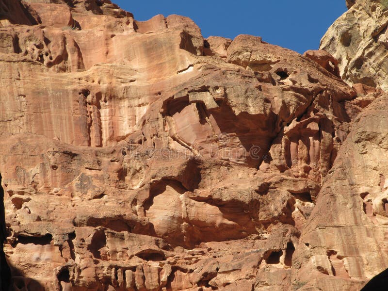 Пещеры древнего города Иордания Petra стоковое фото rf Пещеры древнего города Иордания Petra стоковое фото rf