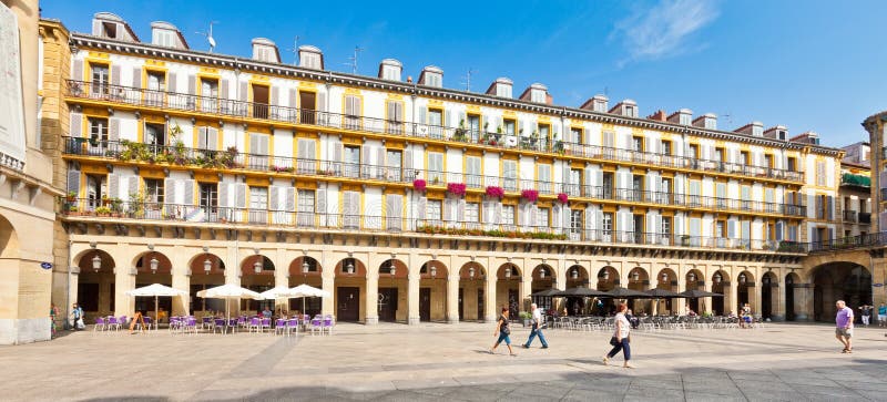 Plaza de la Constitucion in San Sebastian, Spain. Surrounded by buildings with high arcades, this was used as the arena for the first bull races in San Sebastian. Plaza de la Constitucion in San Sebastian, Spain. Surrounded by buildings with high arcades, this was used as the arena for the first bull races in San Sebastian.