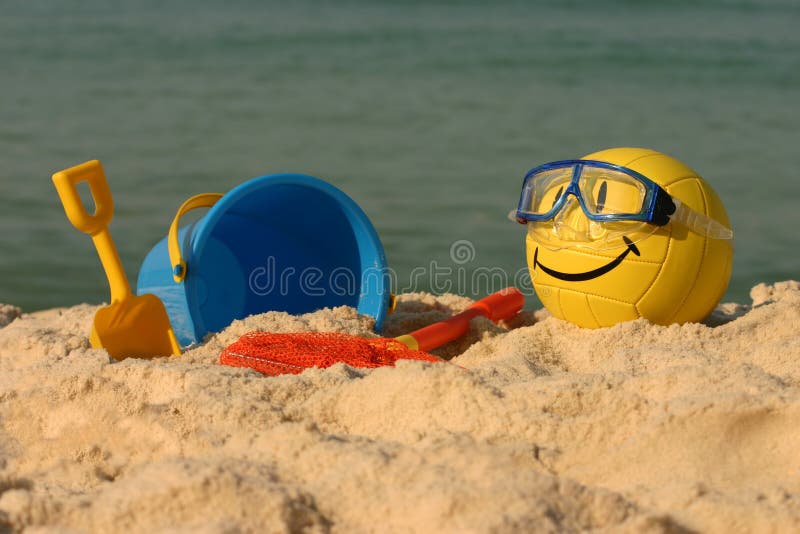 пляж смотрел на волейбол игрушек smiley стоковые фотографии rf пляж смотрел на волейбол игрушек smiley стоковые фотографии rf