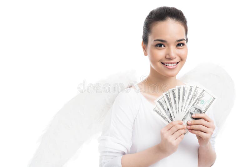 Isolated image of an angel with her hands full of money. Isolated image of an angel with her hands full of money