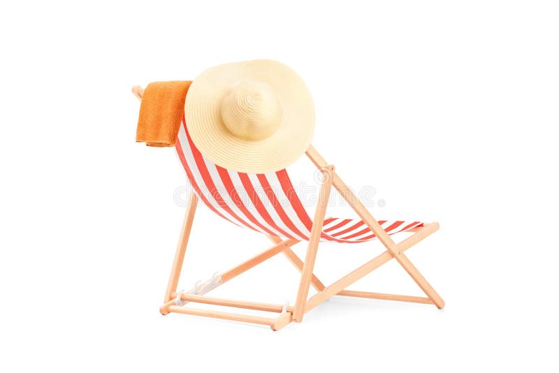 Towel and hat on a sun lounger with stripes, isolated on white background. Towel and hat on a sun lounger with stripes, isolated on white background