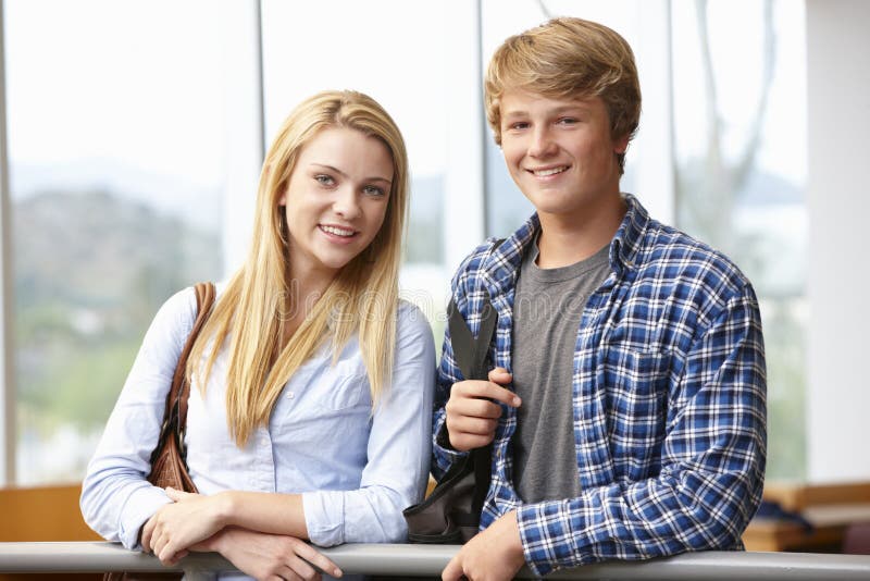 Teenage student girl and boy indoors. Teenage student girl and boy indoors