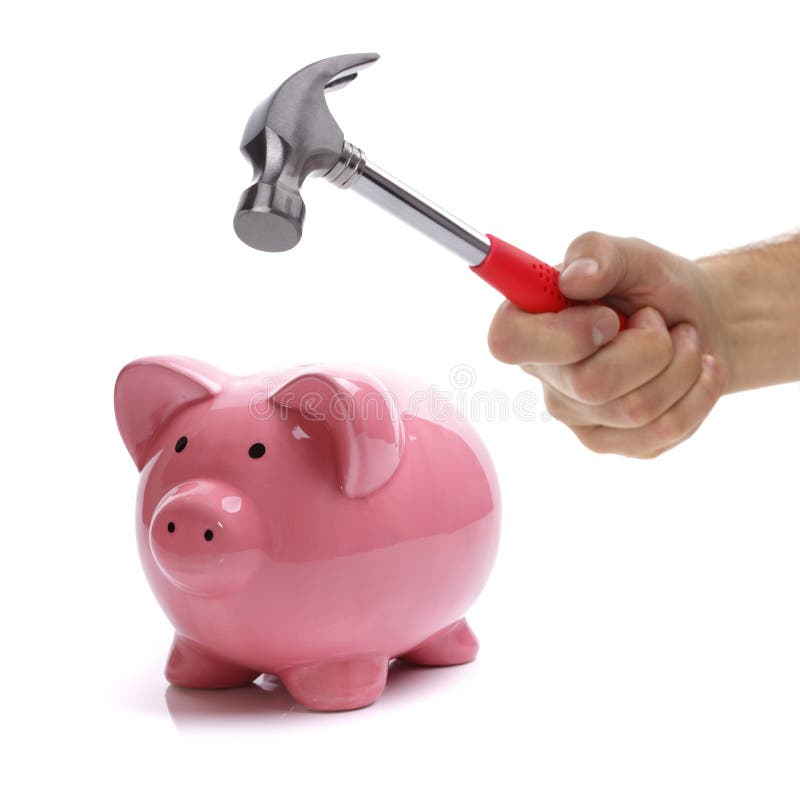 Hand with hammer about to smash piggy bank to get at savings. Hand with hammer about to smash piggy bank to get at savings