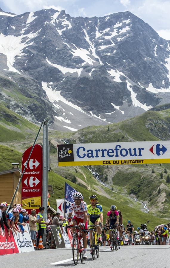 Col du Lautaret, France - July 19, 2014: Joaquim Rodriguez (Katusha Team) wearing the Polka Dot Jersey arrived first on mountain pass Lautaret during the stage 14 of Le Tour de France 2014. He is followed by Rafael Majka (Team Thinkoff-Saxo) whichis the winner of this stage. Col du Lautaret, France - July 19, 2014: Joaquim Rodriguez (Katusha Team) wearing the Polka Dot Jersey arrived first on mountain pass Lautaret during the stage 14 of Le Tour de France 2014. He is followed by Rafael Majka (Team Thinkoff-Saxo) whichis the winner of this stage.