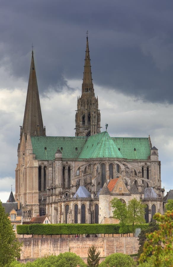 This is an image of The Cathedral of Our Lady of Chartres which is one of the finest example in all France of the Gothic style of architecture.You can see the contrasting two spires of the cathedral,the taller one was built about 500 years later then the other. This is an image of The Cathedral of Our Lady of Chartres which is one of the finest example in all France of the Gothic style of architecture.You can see the contrasting two spires of the cathedral,the taller one was built about 500 years later then the other.